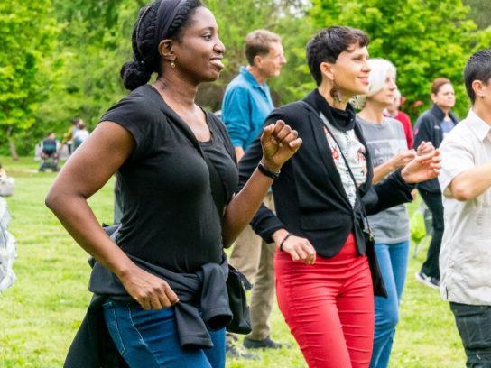 photo of salsa in the parks attendees dancing